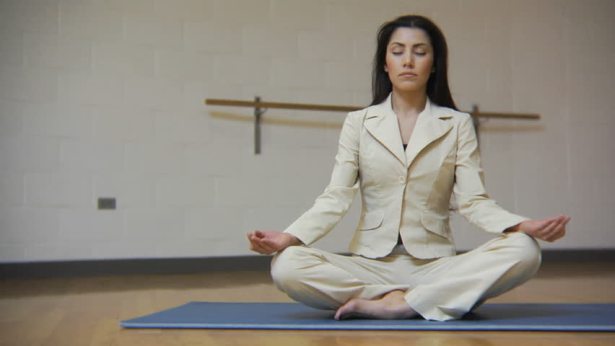 woman in suit yoga